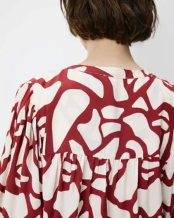 Blouse col V à imprimé géométrique terracotta Ambrine
