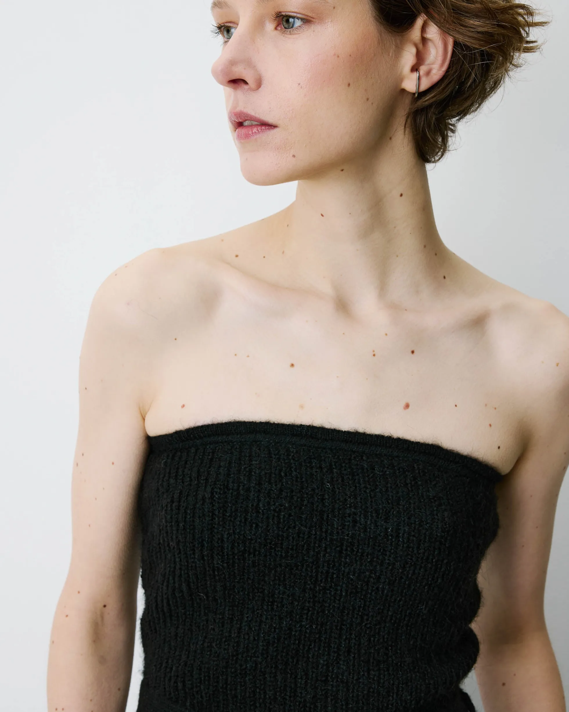 Bustier péplum ceinturé en maille côtelée noir Berry