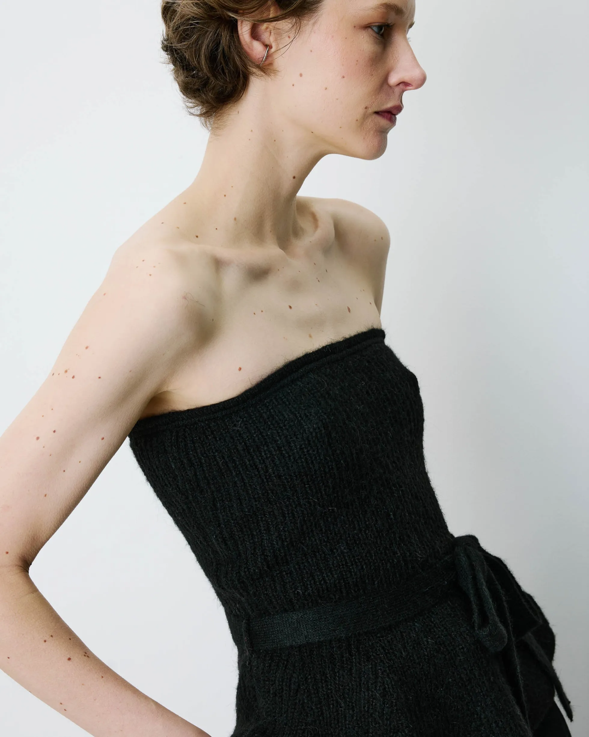 Bustier péplum ceinturé en maille côtelée noir Berry