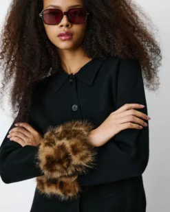 Gilet en maille poignets fausse fourrure noir Bambino
