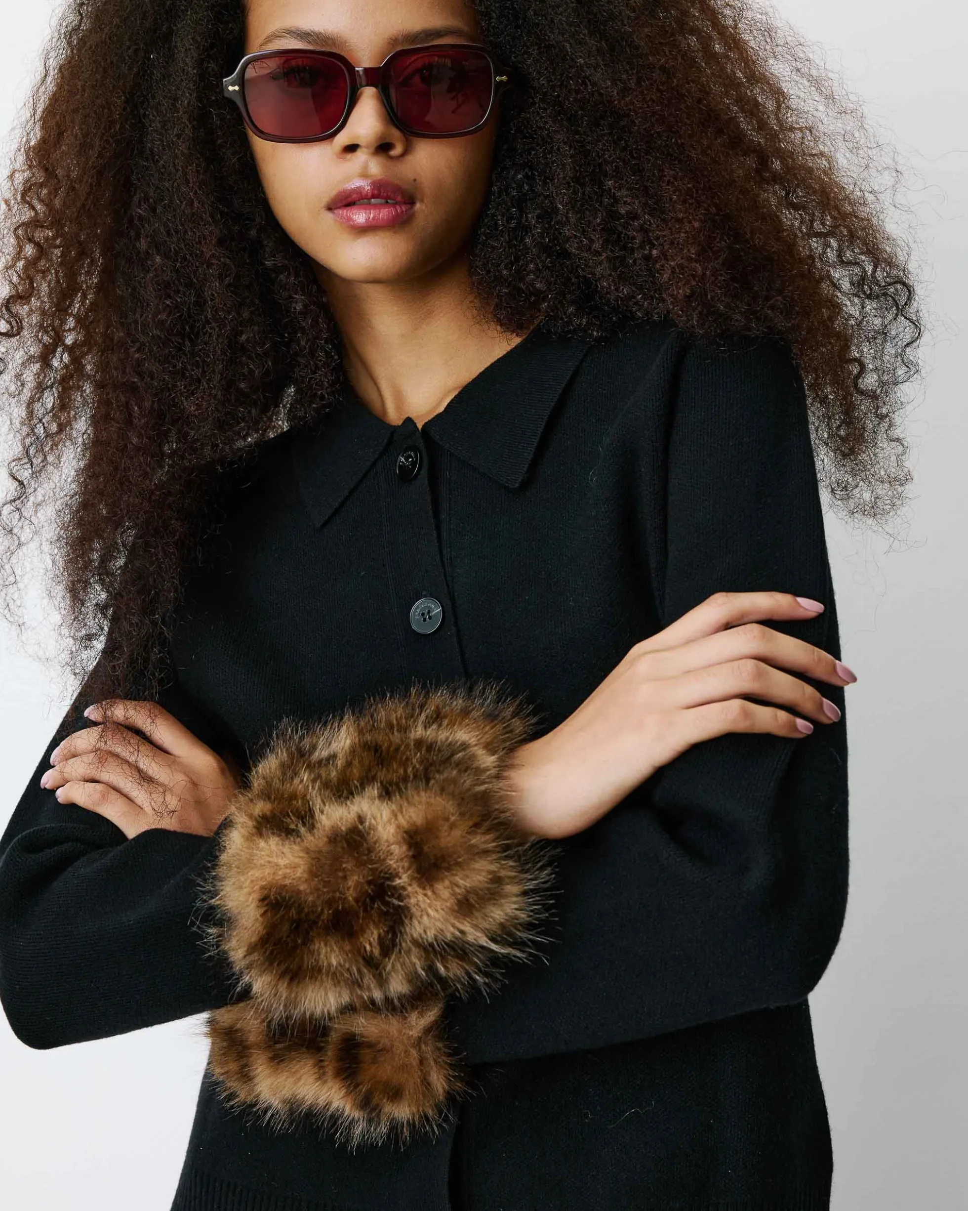 Gilet en maille poignets fausse fourrure noir Bambino
