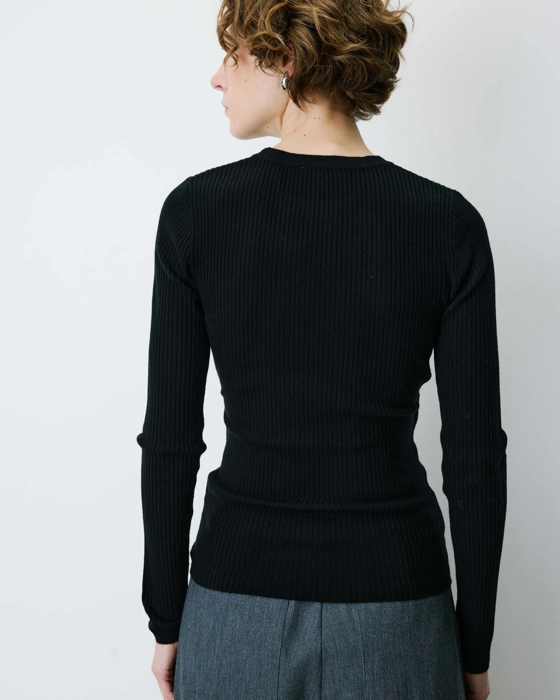 Pull cache-cœur col V près du corps noir Bindi