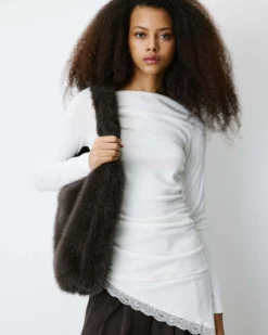 Top asymétrique manches longues bas en dentelle ivoire Bina