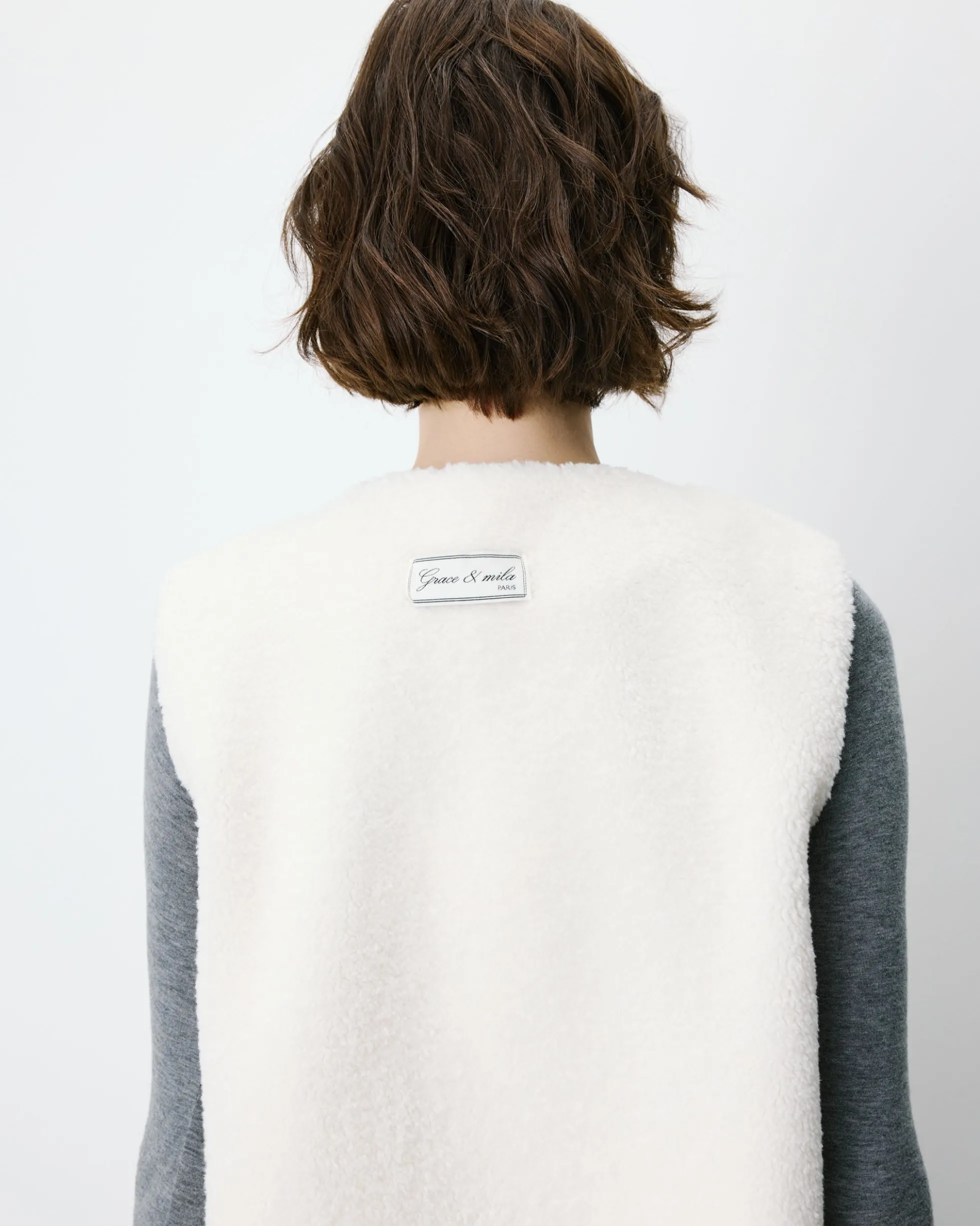 Veste sans manches en fausse shearling ecru Avery